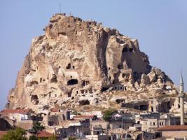 Homes cut into the cliffs